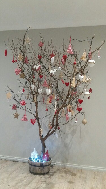 Christmas tree branch decorating a tree for christmas